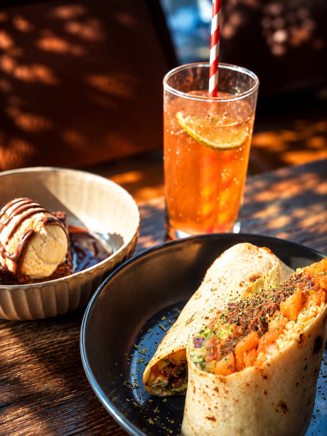Burrito served with a refreshing drink